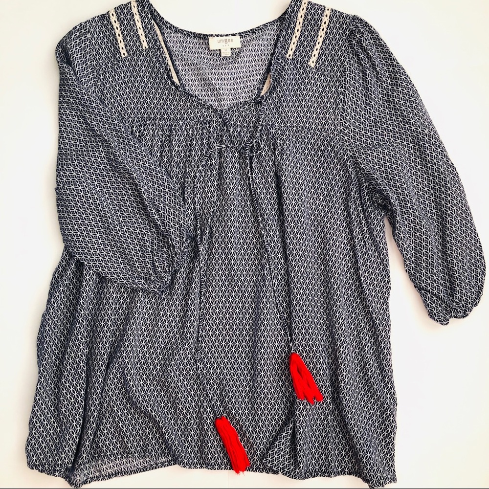 Navy and white umgee peasant top with red tassels